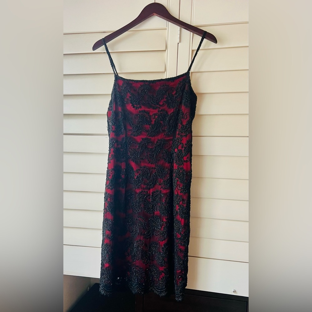 Beaded cocktail dress by East.